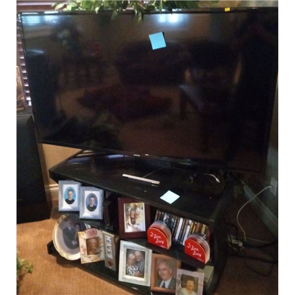 64" Samsung Television & Sonax T.V. Stand  Model # UN65J6200AF Contents Not Included