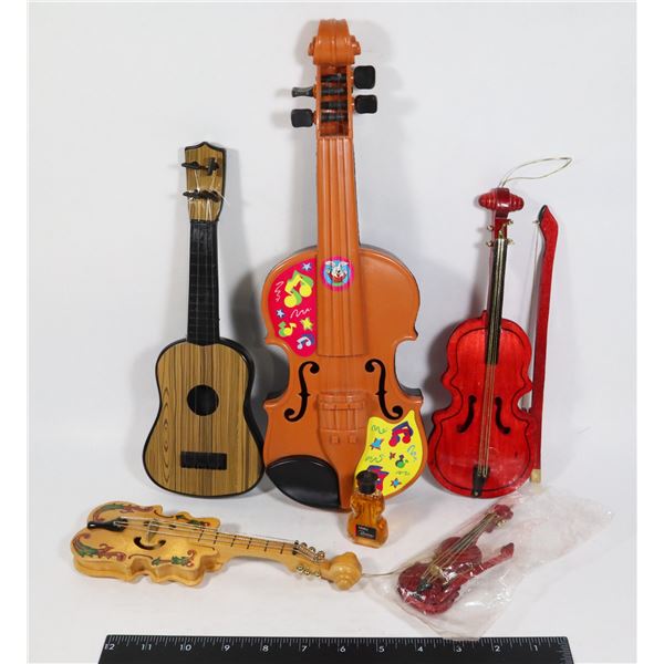 LOT OF DECORATIVE GUITAR AND VIOLINS