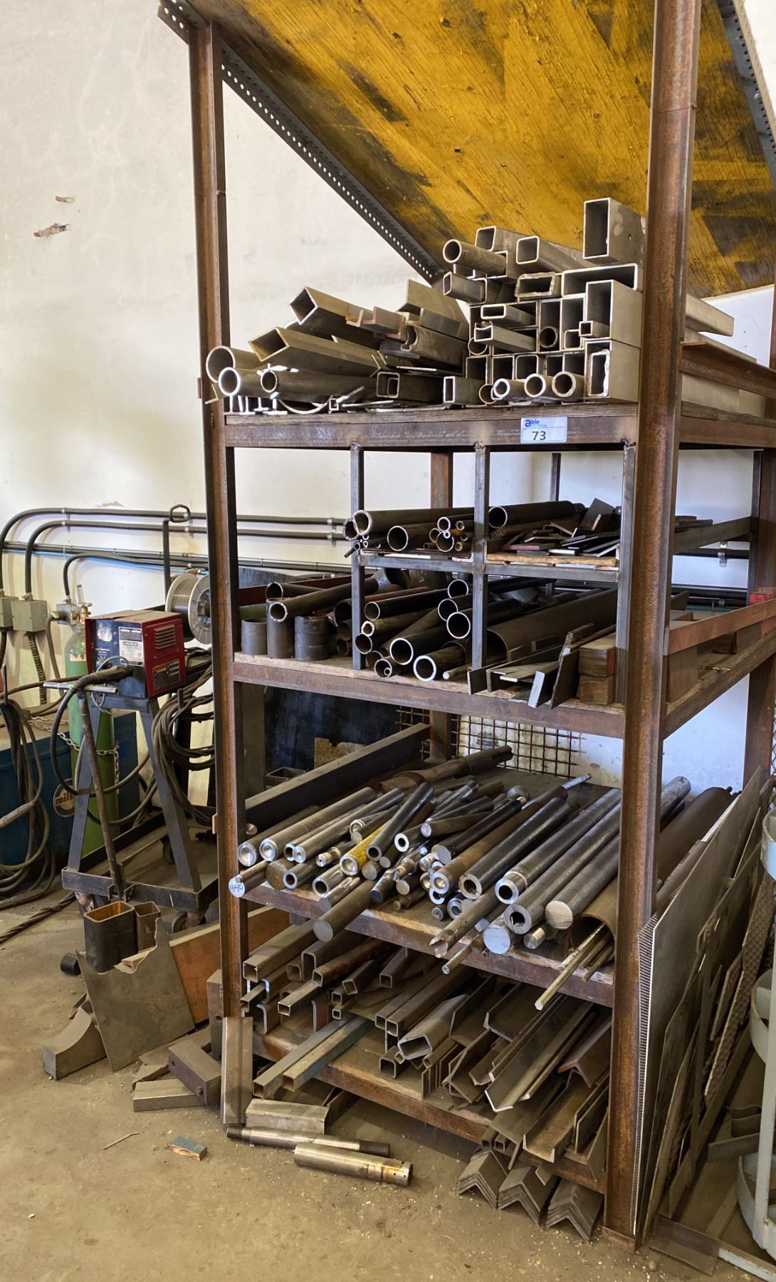 4 X 4 X 8'H METAL FRAMED WOOD RACK WITH LARGE SELECTION OF RANDOM METAL ...