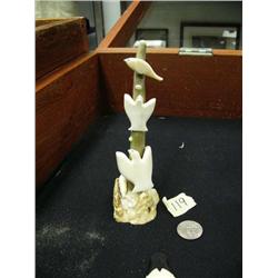 2 ivory birds and a seal and whale mounted on fossilized ivory by Burt Kulk (2)