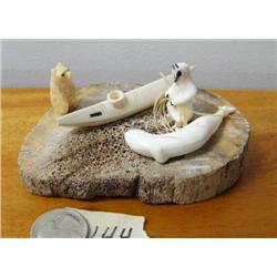 Ivory hunter with kayak, whale and bear (2)