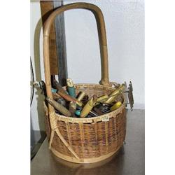 Basket with a lot of antique kitchen utensils with painted wooden green handles (2)