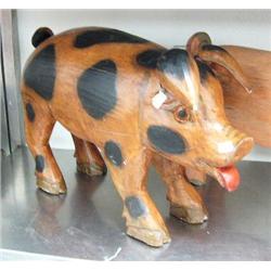 Wood hog- 15-1/2" tall, 25-1/4" from tail to snout (2)