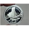 Image 2 : 2003 Proof Silver Dollar. Commemorates the 100th Anniversary of a blacksmith throwing a hammer at a 