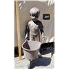 Image 1 : Boy statue with metal wheel barrow.