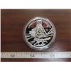 Image 1 : 2003 Proof Silver Dollar. Commemorates the 100th Anniversary of a blacksmith throwing a hammer at a 