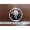 Image 2 : 2003 Proof Silver Dollar. Commemorates the 100th Anniversary of a blacksmith throwing a hammer at a 