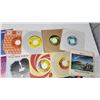 Image 4 : Collection of small 45rpm vinyl records, w/ stand
