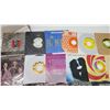 Image 5 : Collection of small 45rpm vinyl records, w/ stand