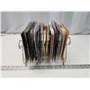 Image 7 : Collection of small 45rpm vinyl records, w/ stand