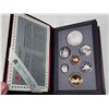 Image 1 : 1994 Canadian double dollar set - includes Dogsled team silver dollar
