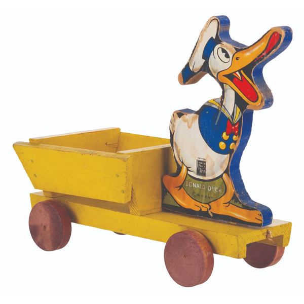 A Fisher-Price Donald Duck Cart Toy.