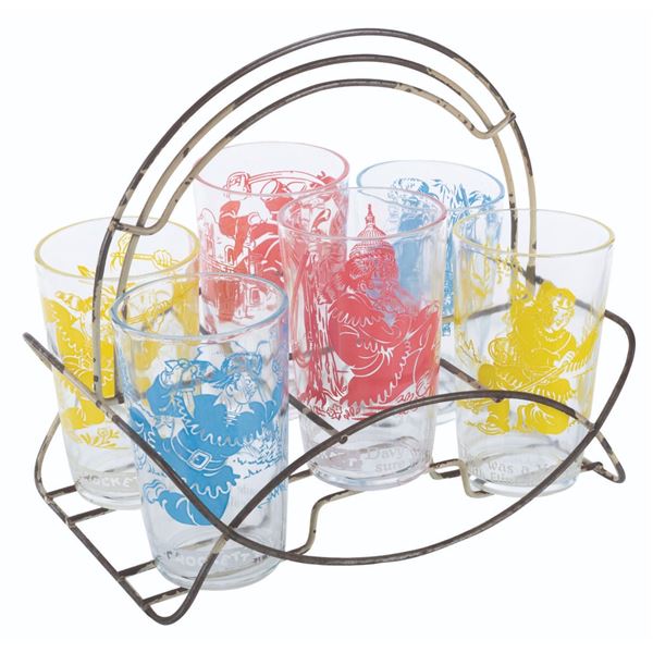 A Set of Davy Crockett Cups and Holder.