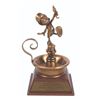 Image 1 : A Jiminy Cricket Bronze 30 Year Service Award.