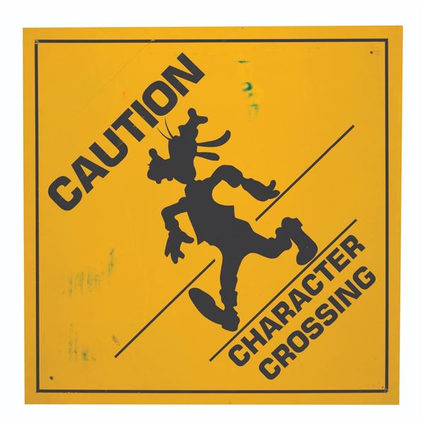 A  Caution Character Crossing  Sign.