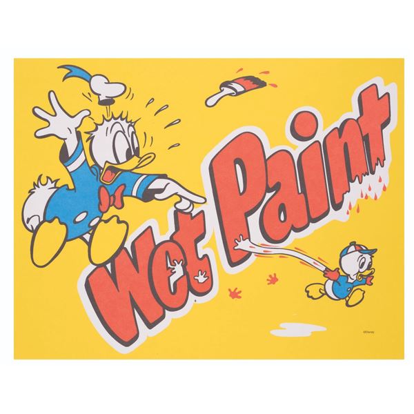 A Donald Duck "Wet Paint" Sign.