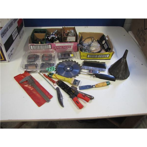 Shop items including screwdriver bits , some plumbing, scraper