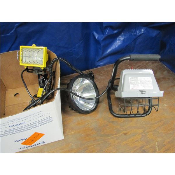 Halogen 120 volt work lights, and Coleman night site 12 Volt halogen spotlight & clamp on work light