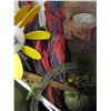 Image 2 : green garbage barrel with hand saw, extention cord etc.