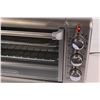Image 2 : Black & Decker Brushed Aluminum Toaster Oven - Powers Up 22" Wide 12" High