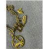 Image 2 : Unusual Gold Plated Charm Bracelet. B.C. Related Charms
