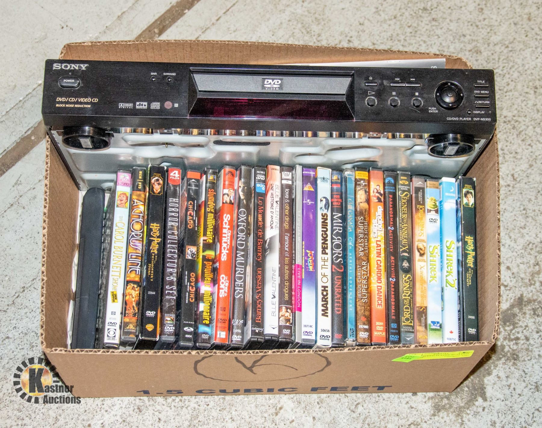 SONY CD/DVD PLAYER W/ 24 DVD MOVIES - Kastner Auctions