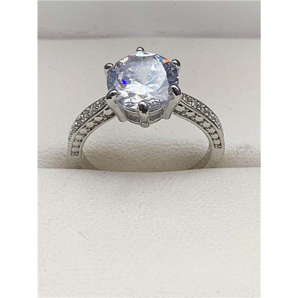 Ladies Brilliant Cut Vera Wang Styled 1.0 Carat Solitaire with bezel set band engagement ring