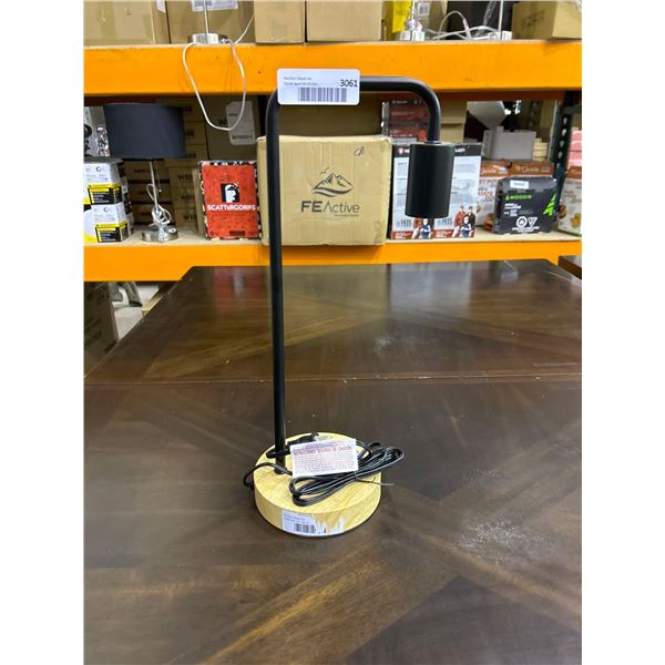 Desk top lamp with USB outlets