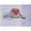 Image 1 : SIZE 6.5 DARK PINK CZ ON SILVERTONE HALO RING