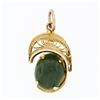 Image 1 : Vintage 14k Yellow Gold Oval Cabochon Cut Jade Detailed Open Swirl Charm Pendant