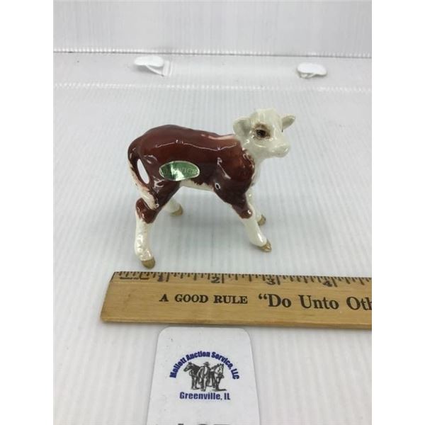 BESWICK BROWN AND WHITE HEREFORD CALF FIGURINE