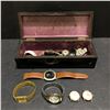 Image 1 : Group of assorted vintage watches in glove box