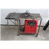 Image 1 : Lincoln Arc Welder AC 225 With Cables and Stand on Casters