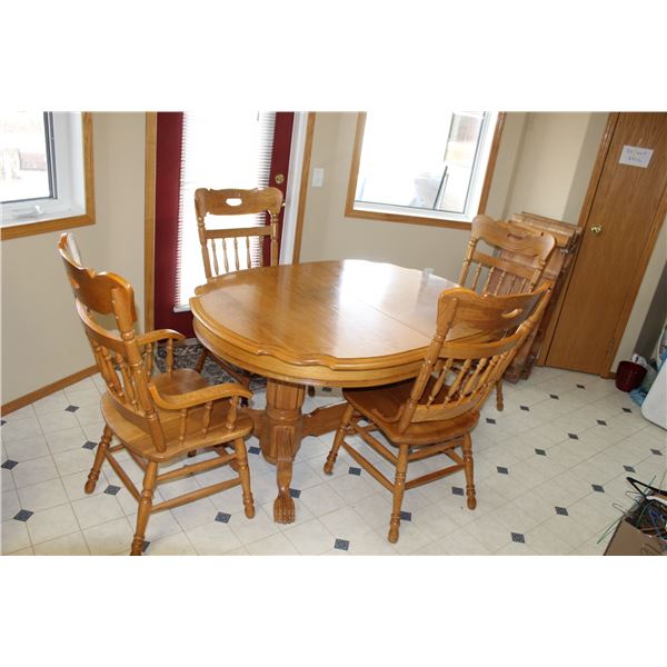 Oak Dining Room Table - 55" x 42", Double Pedestal, Two Extension Leaves, Six Chairs