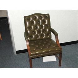 GREEN LEATHER RECEPTION CHAIR.