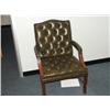 Image 1 : GREEN LEATHER RECEPTION CHAIR.
