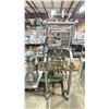 Image 1 : STAINLESS STEEL COMMERCIAL VERTICAL / HORIZONTAL PACKAGE SEALING SYSTEM WITH COUNTER, FEEDER
