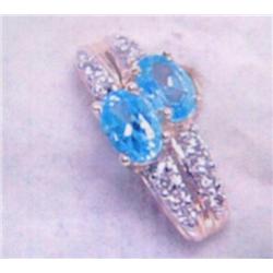 Blue Topaz and Diamond Pendant, 14K yellow gold- blue topaz are oval, faceted, approx. 1.00 carats, 