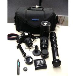 Canon EOS Rebel G camera with 2x converter- Quantaray Tech-10 70-300mm, 1:4 - 5.6 Macro, with camera