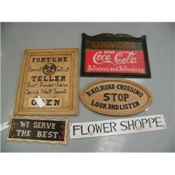 Lot of: Wood fortune teller sign, Coke sign, railroad sign, "We serve the best", flower shop sign (4