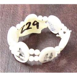 Ivory bracelet with scrimshawed Eskimo figures (2)
