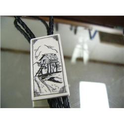 CHOICE on 2 scrimshawed ivory bolo ties: cache (2)