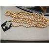 Image 2 : CHOICE on three 64" pearl necklaces (2)
