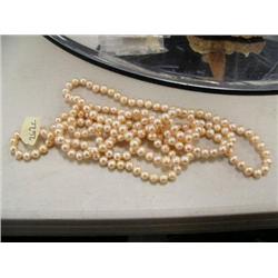 CHOICE on three 64" pearl necklaces (2)
