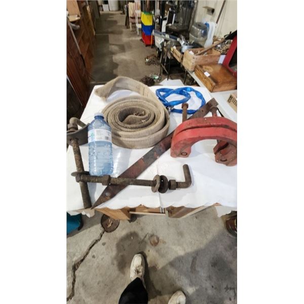 Lifting strap, lawn mower blade, tie down bolts