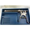 Image 1 : Syringe gun