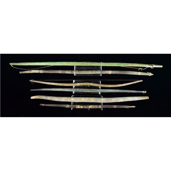 SIX NATIVE AMERICAN BOWS.