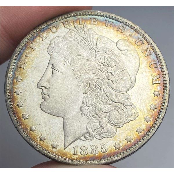 Toned 1885-O Morgan Silver Dollar MS64