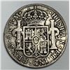 Image 2 : Chopmarked Spanish Colonial (America's First Silver Dollar)