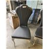 Image 2 : 2 MODERN BLACK LEATHER AND CHROME ACCENT CHAIRS